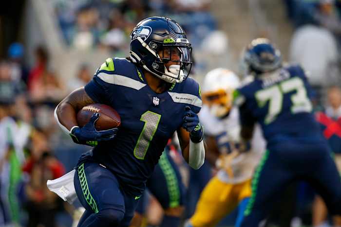 NFL: Los Angeles Chargers at Seattle Seahawks Aug 28, 2021; Seattle, Washington, USA; Seattle Seahawks wide receiver D'Wayne Eskridge (1) runs the ball against the Los Angeles Chargers during the first quarter at Lumen Field. Mandatory Credit: Joe Nicholson-USA TODAY Sports